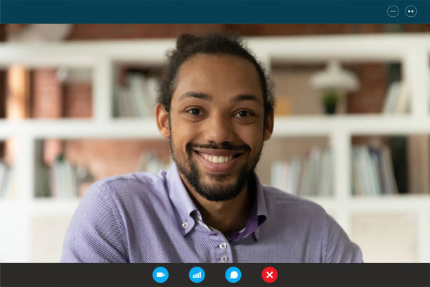 istock Smiling African American man have webcam call 1282036375