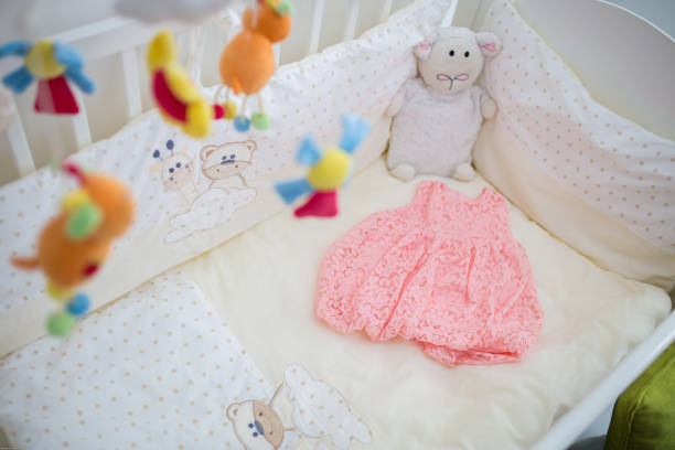 istock Baby crib in nursery room 1282037117