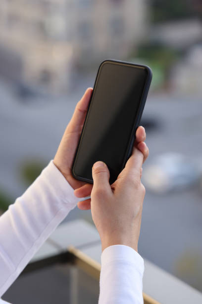 istock Woman hand typing on smartphone. 1282047468