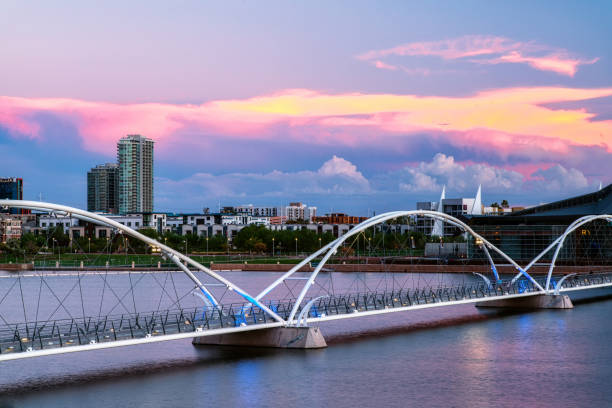 Pedestrian Bridge at Tempe Town Lake Monsoon clouds over the pedestrian bridge at Tempe Town Lake in Tempe, Arizona sonoran desert stock pictures, royalty-free photos & images