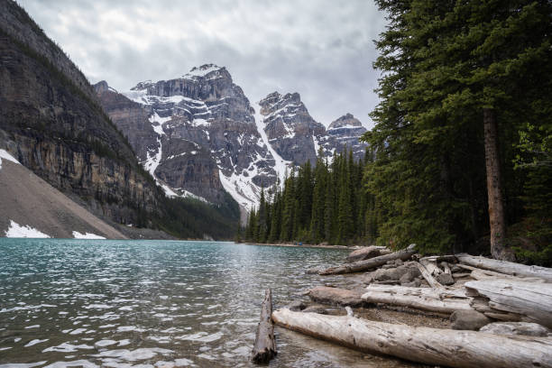 istock Beautiful alpine lake with turquoise waters surrounded by magnificent peaks 1282065195