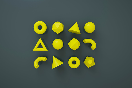 Conjunto de elementos realistas 3D aislados sobre fondo de color. Esferas, toros, conos y otras formas geométricas. Colores amarillos para diseños de moda. photo