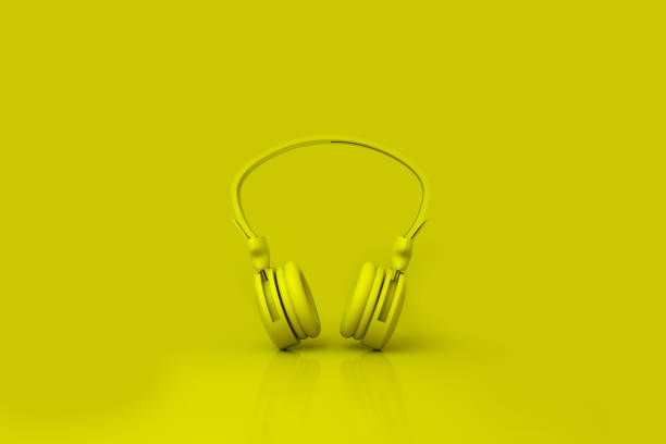 istock Minimal yellow background yellow headphones 3d rendering 1282078495