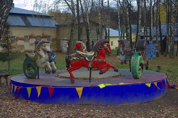 istock old carousel with animal figures in the park 1282085245