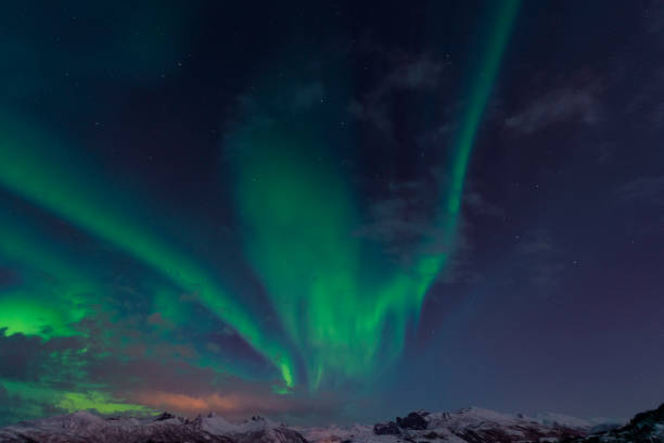 istock Aurora Northern Polar light in night sky over Northern Norway 1282085561