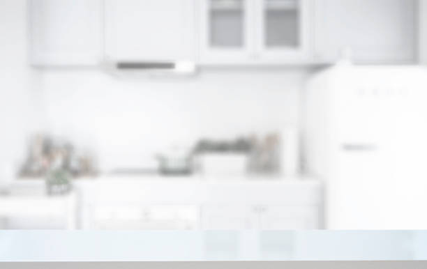 istock White wooden counter table in kitchen room background. 1282090804