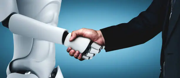 Photo of 3D rendering humanoid robot handshake to collaborate future technology