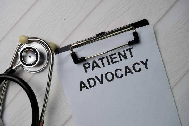 istock Patient Advocacy text write on a paperwork isolated on office desk. 1282093195