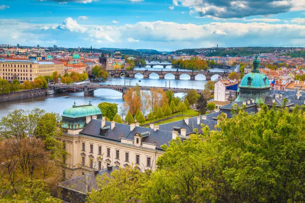 Photo of Prague cityscape with bridges over the Vltava river, Czech Republic