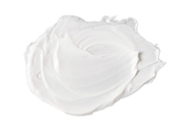 istock white cosmetic face cream texture on white background 1282096052