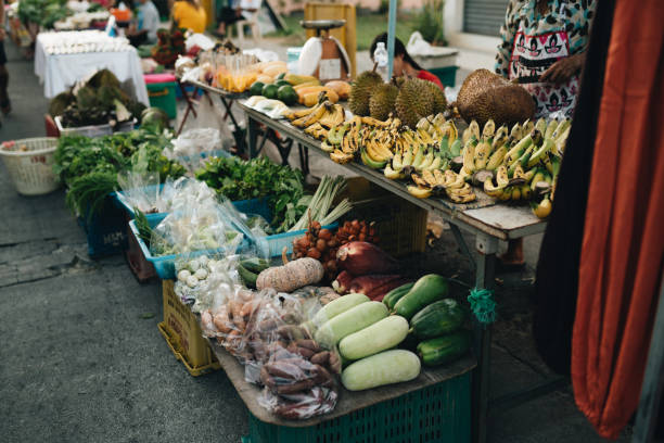 istock Counter with fruit on Saturday market, koh Phangan Thailand 1282096659