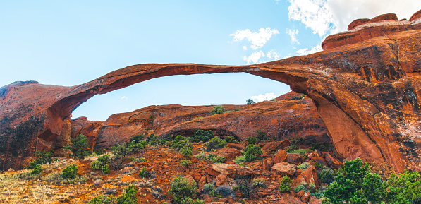The Landscape Arch in the Arches National Park in Utah, United States, looks like a thin bridge and is the longest natural arch in the park which have thousands of natural red rock arches, pinnacles and giant balanced rocks.