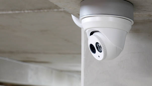 istock CCTV surveillance camera installed on concrete wall in the building 1282096946