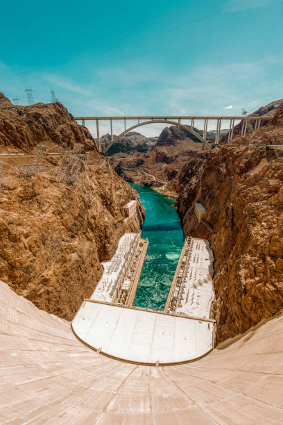 The Hoover Dam in the Black Canyon of the Colorado River on the border between Nevada and Arizona, USA, seen a hot summer day.