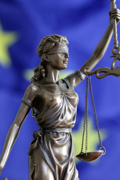 istock Symbol image: Justitia in front of a Europe flag 1282099752