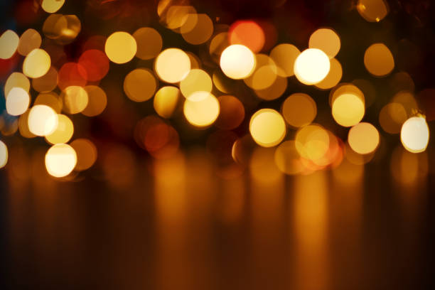 istock Christmas lights background with golden bokeh 1282100051