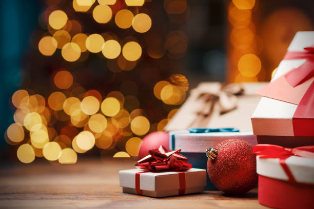 istock Beautiful Christmas gifts and decorative lights 1282100106