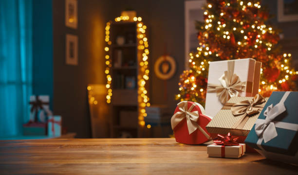Beautiful Christmas gifts and decorative lights stock photo