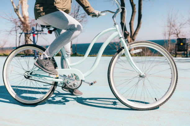 istock Woman riding a blue bike 1282101104