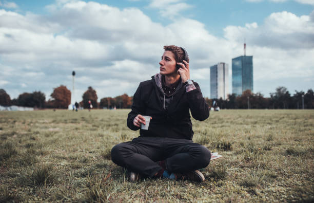 istock Young Man Relaxing On His Skateboard 1282105045