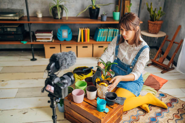 istock Botanist using COVID-19 quarantine to transfer her knowledge about plant nursery to her followers 1282106130