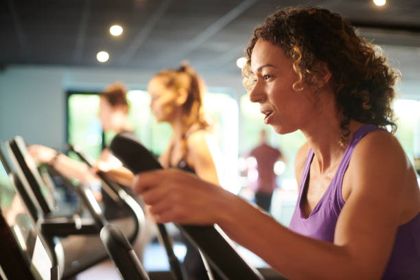 istock cross trainer at the gym 1282109742