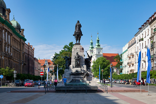 Krakow, Poland - June 06 2019: The Grunwald Monument (Polish: Pomnik Grunwaldzki) is an equestrian statue of King of Poland Władysław II Jagiełło located at Matejko Square in the Old Town and created by Antoni Wiwulski in 1910 to commemorate the 500th anniversary of the Battle of Grunwald.