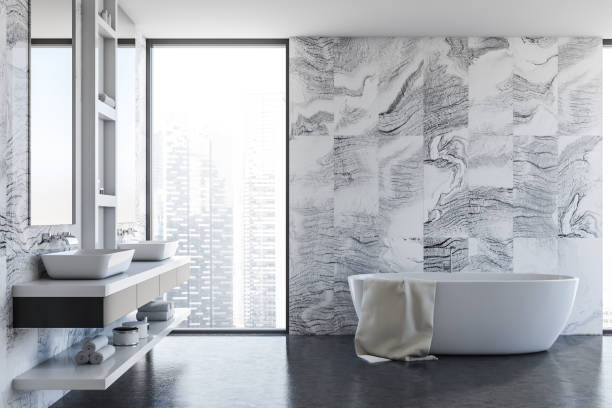 istock Tub and sink in modern white marble bathroom 1282111733