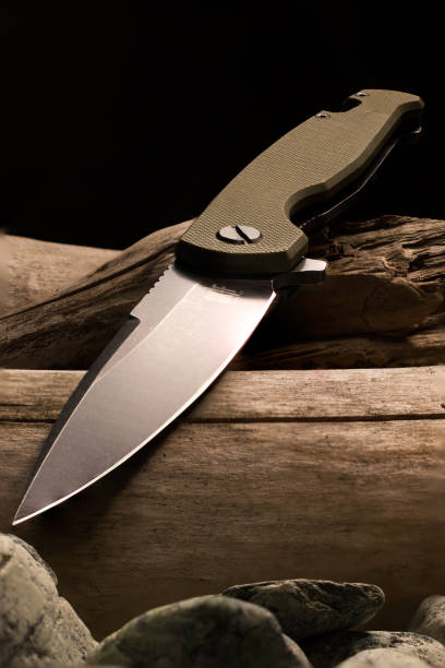 istock Sharp knife bottom view. Knife on top of the composition. 1282111753