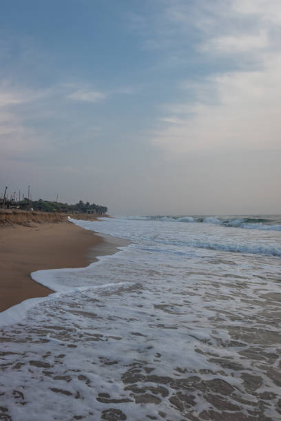 istock Sunrise at sandy beach of pondicheery india 1282111886
