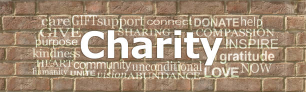 istock Words associated with Charity Brick Wall Word Cloud 1282112060