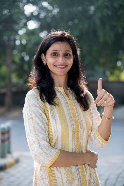 istock Gorgeous young woman giving a thumbs up 1282112381