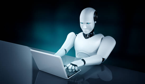 istock Robot humanoid use laptop and sit at table in future office 1282113829