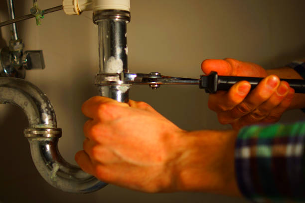 istock Professional installer with wrench test tube. 1282115141