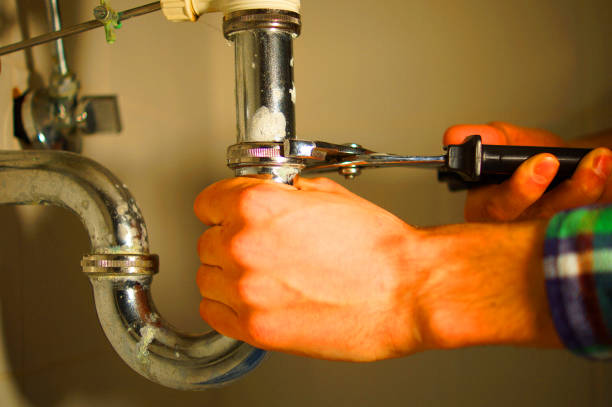 istock Professional installer with wrench test tube. 1282116171
