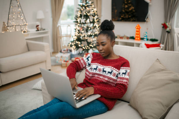istock Young African American female student working from home 1282117099