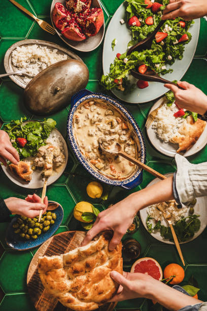 istock Flat-lay of people having Turkish style dinner for Ramazan supper 1282120908