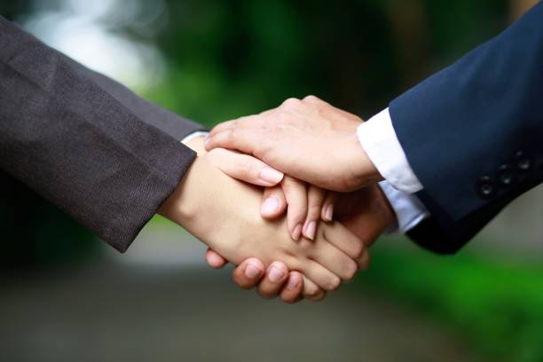 istock Business people congratulate management 1282128402