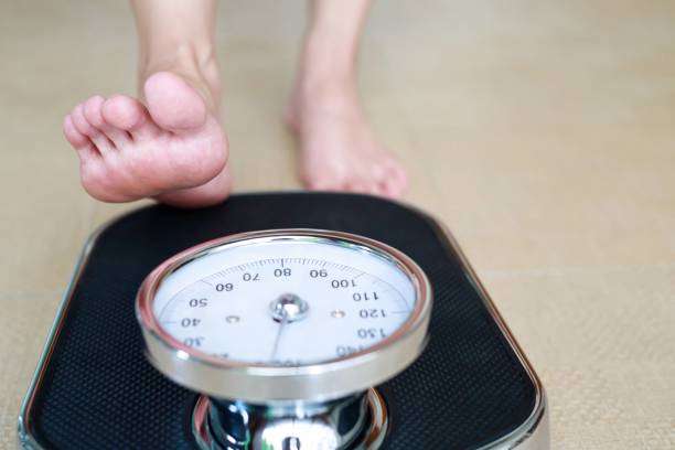 istock Weight scales for obese people 1282129801
