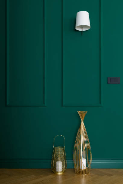istock Emerald green wall and golden decorations 1282131431