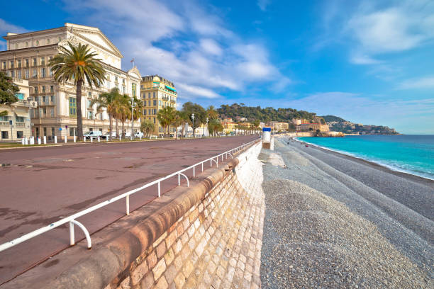 english promenade famous walkway and beach in city of nice, french riviera - city of nice france french riviera promenade des anglais imagens e fotografias de stock
