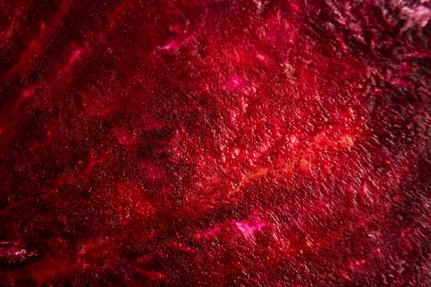 istock Macro background of beetroot sliced on white background 1282133083