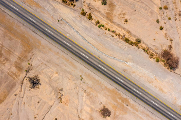 istock Desert highway road, Aerial image 1282133975