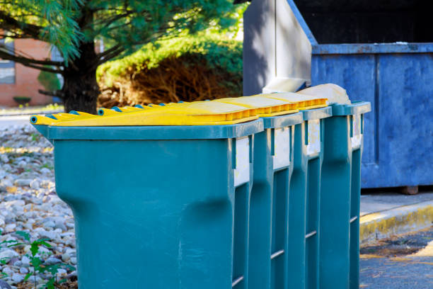 istock Garbage containers near apartment building in district garbage bins to help separate recycle 1282134112