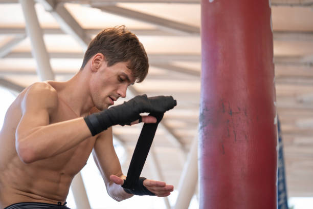 istock Muay Thai men fighter wearing hand wraps. 1282134993