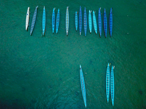 Rowboats used for the Dragon Boat race can be seen by drone in Sai Kung harbour, in Hong Kong's New Territories