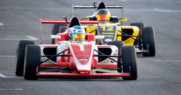 istock Drivers driving racing cars 1282139240