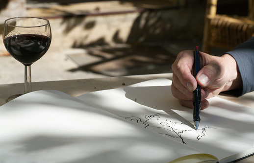 Hands and sketch pad