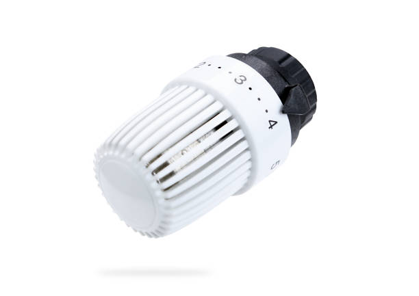 istock Thermostatic radiator valve closeup isolated on a white background. Stacking. 1282145273