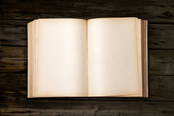 istock Old Antique Book on wood table 1282147073